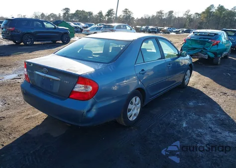 2002 Toyota Camry Le z USA, uszkodzony, nr VIN 4T1BE32K92U569527